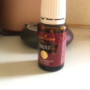 Used- Half full Young Living Thieves essential oil
